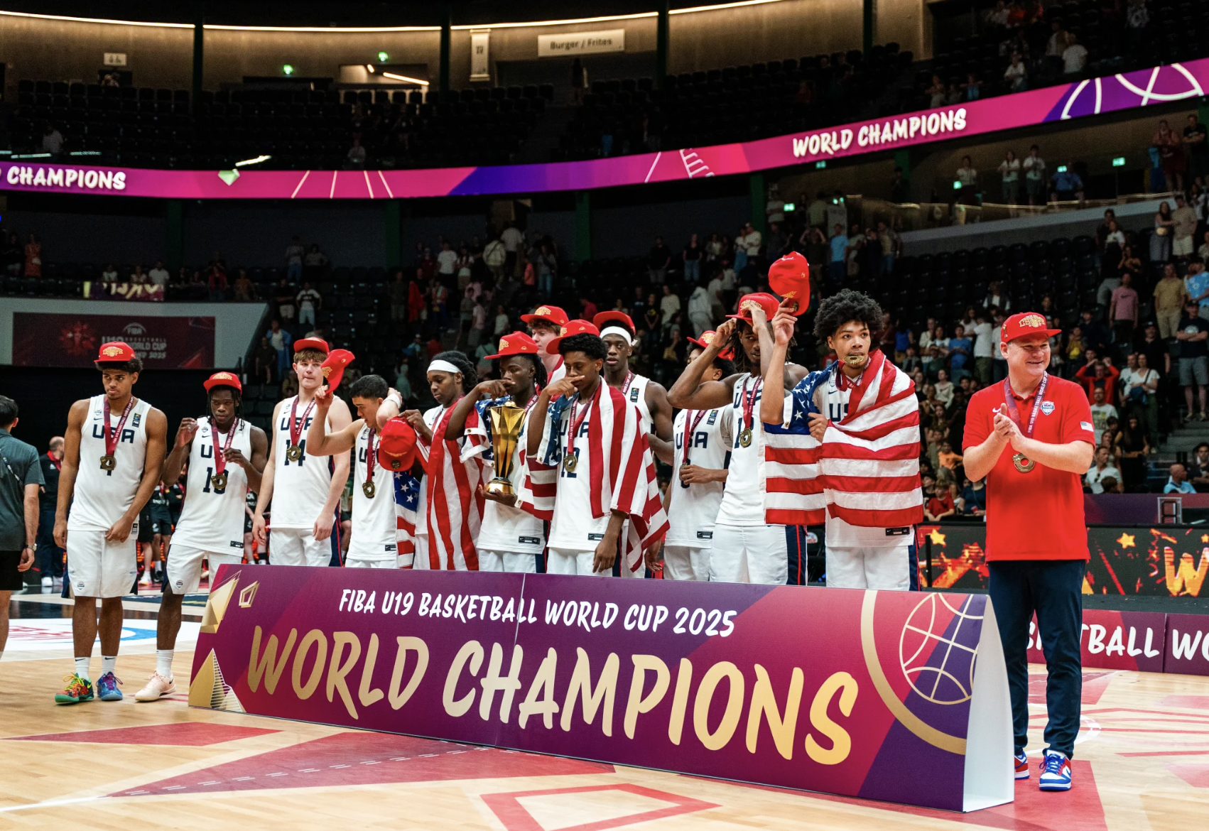 Koa Peat, Tommy Lloyd, USA player celebrate U19 World Cup gold